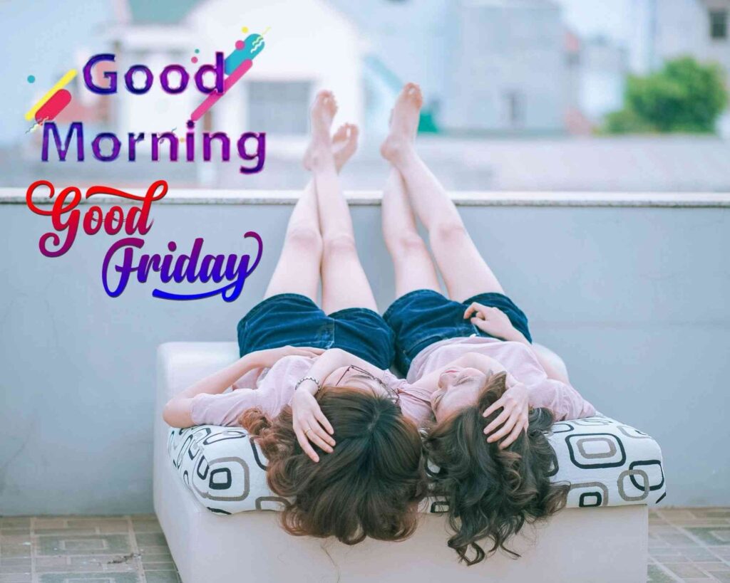 Two women sitting on a wall, smiling, with the words "happy friday" written above them.