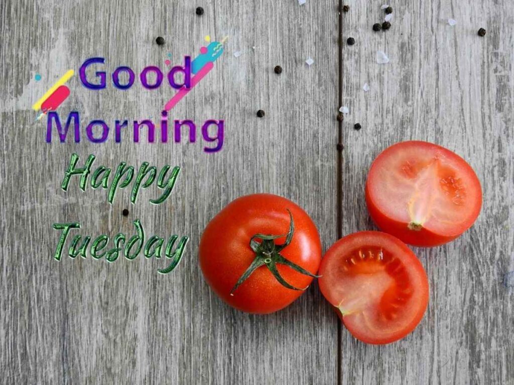 Fresh tomatoes with 'good morning happy tuesday' text overlay, perfect for fall vibes.