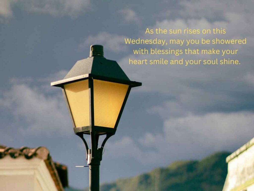 A sunrise with golden rays shining on a heart-shaped shower of blessings, illuminating the soul with wednesday morning's goodness.