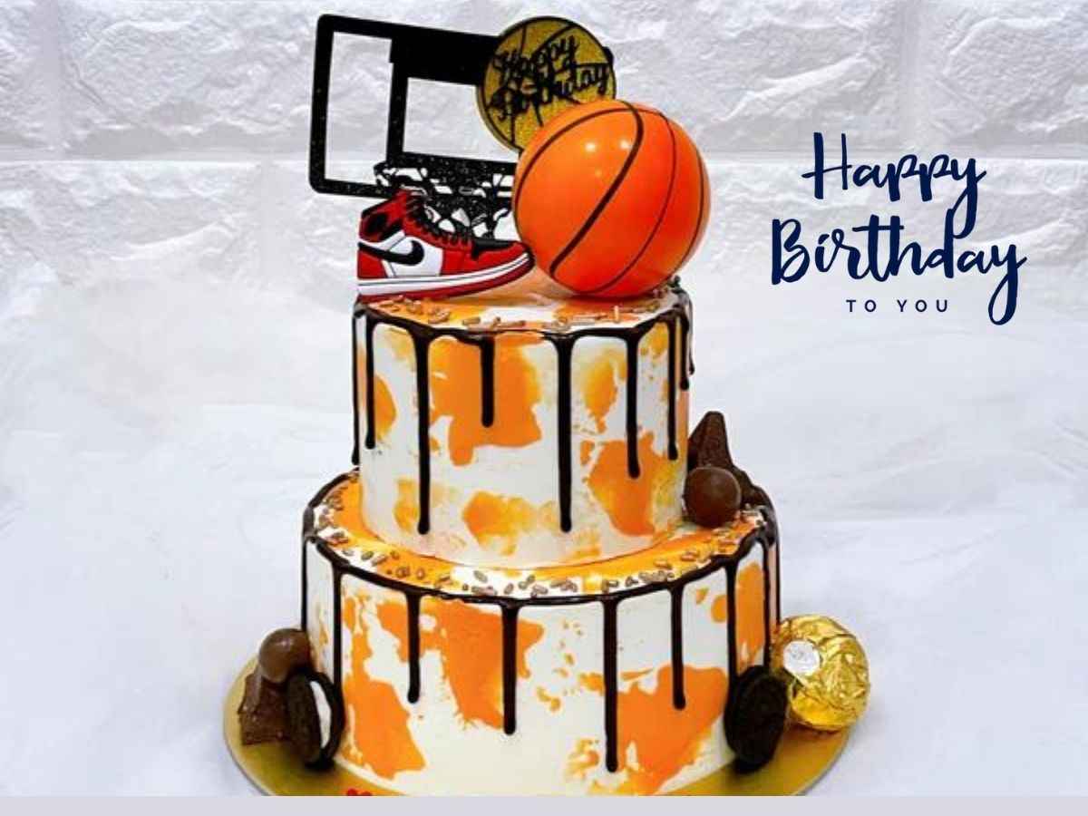 A fun cake showcasing a basketball hoop and ball, combining dessert with a love for basketball in a delightful way.